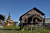 Inle Lake Myanmar. All the buildings are constructed on piles. Residents travel around by canoe, but there are also bamboo walkways and bridges over the canals, monasteries and stupas. 